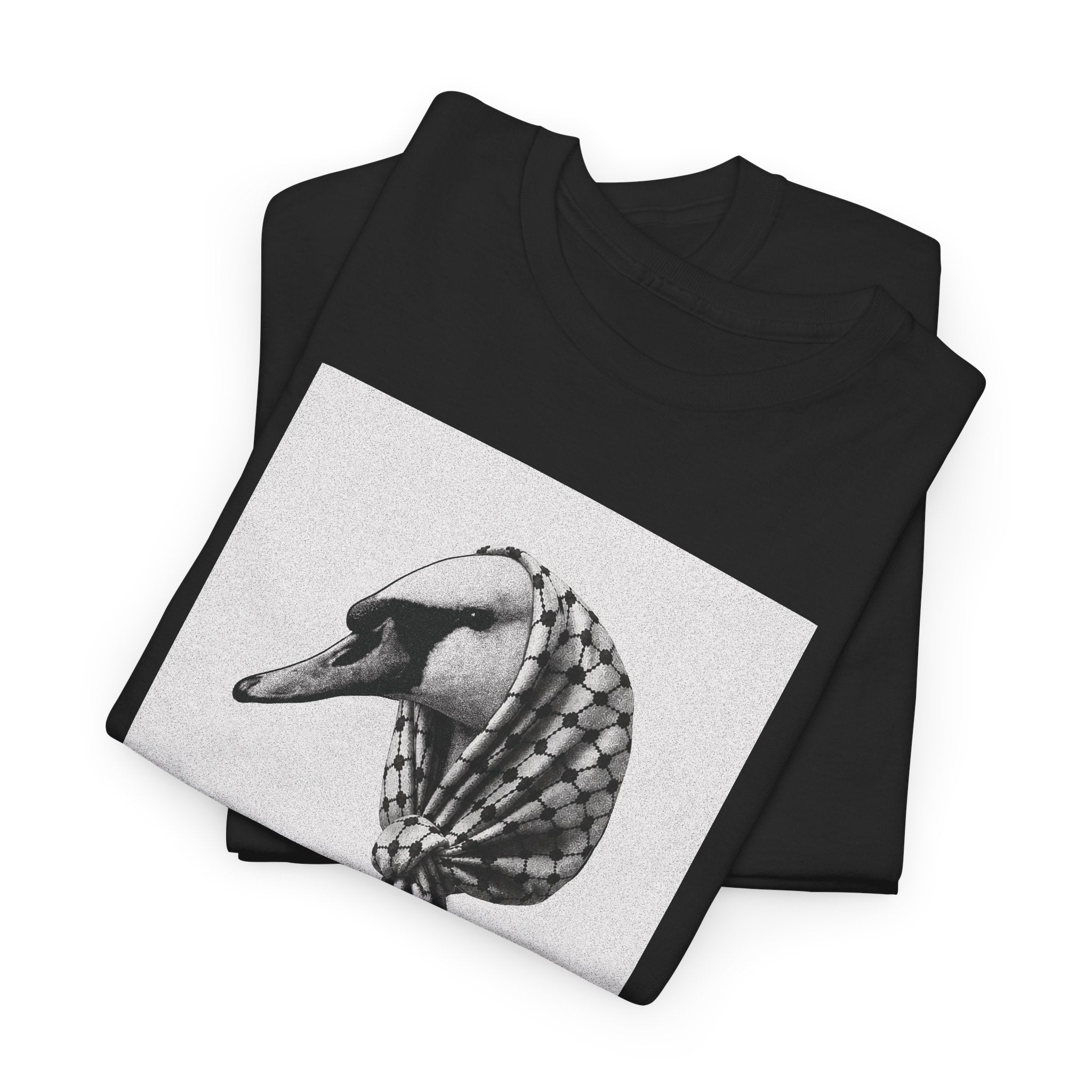 A folded black crewneck t-shirt featuring a square graphic print of a black and white goose wearing a palestinian keffiyeh, displayed on a clean white background.